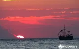 Side Sunset Boat Tour with Dinner, Drinks, and Entertainment — 10/11