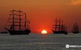 Side Sunset Boat Tour with Dinner, Drinks, and Entertainment — 11/11